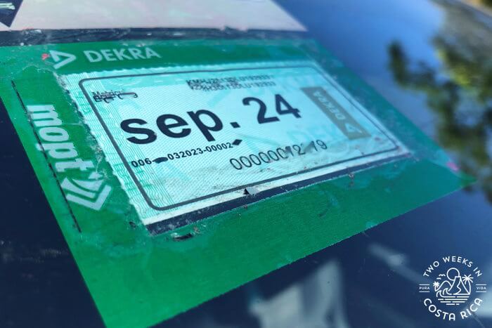 Costa Rica vehicle inspection sticker on windshield