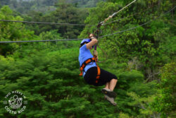Zip lining through jungle near Arenal Volcano